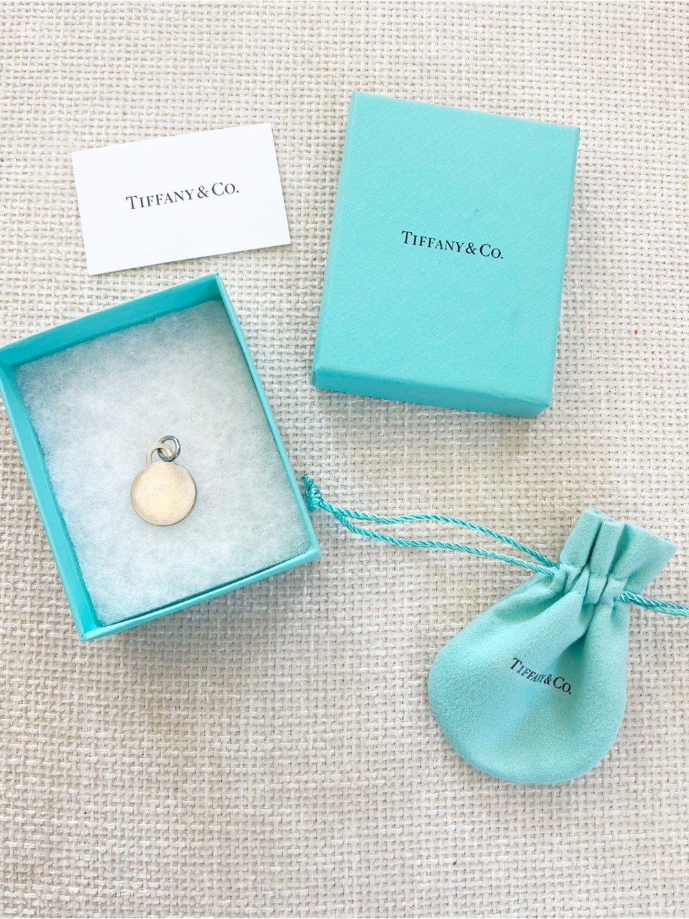 Tiffany & Co. Sterling Silver Round Disc Initial Charm Signature Blue Packaging